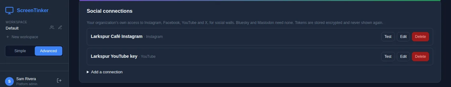 The Social connections section of Settings. It says the organization's own access to Instagram, Facebook, YouTube and X is used for social walls, that Bluesky and Mastodon need none, and that tokens are stored encrypted. Two connections are listed: Larkspur Café Instagram and Larkspur YouTube key, each with Test, Edit and Delete buttons. Below is Add a connection.